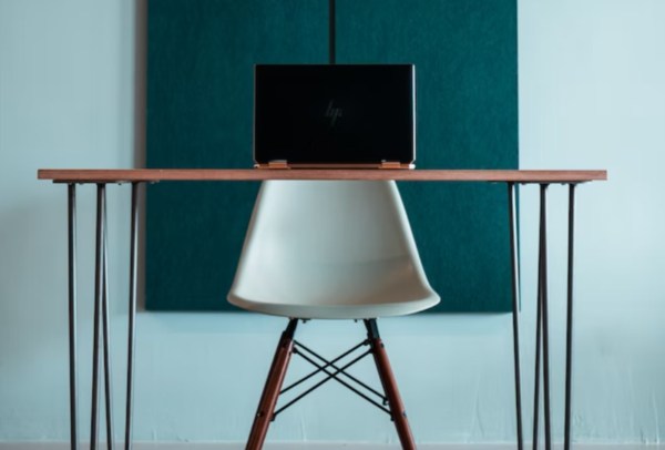 Position your work desk’s seating area against a wall